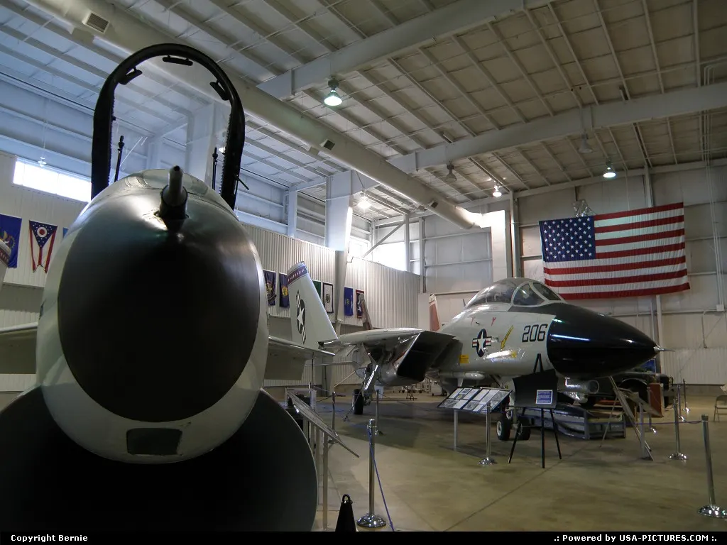 Mouth wide opened, this F-8 Crusader seems to eat me in Battleship Memorial hangar.