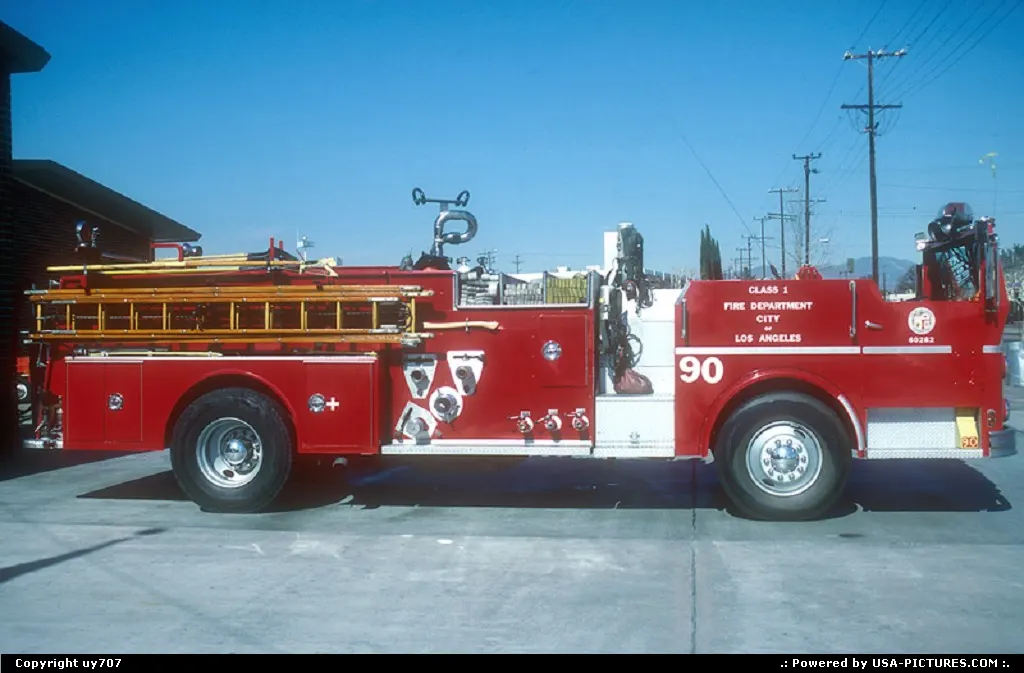 Another roofless fire engine resting between two missions