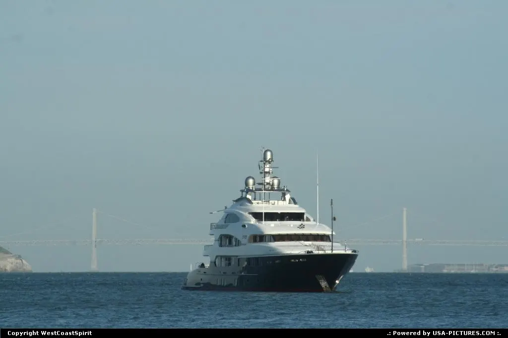 Nice yacht cruising in the Golden Gate Bay with the Bay Bridge (Oakland to San Francisc...
