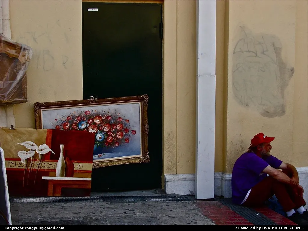 Artist selling his wares at a flea market