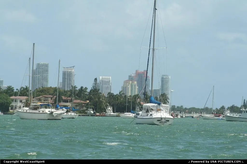 Cruising in the bay. Miami beach afar.