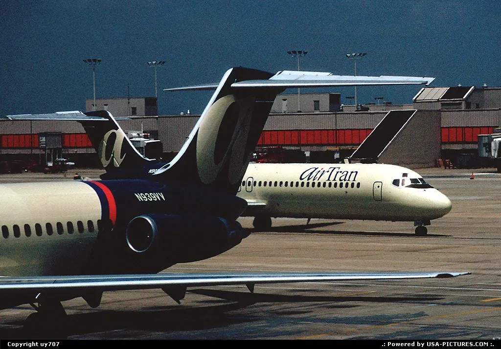 Air Tran at home but both still then in the first livery and operating Douglas DC.9-30s...