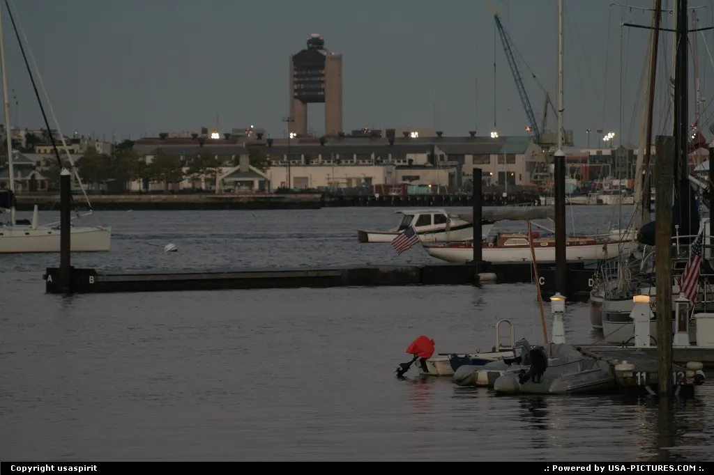 Boston harbor. View of the airport tower control. Waiting for water taxi