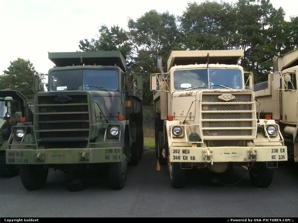 Two of a kind! M915 20 Ton dump trucks
