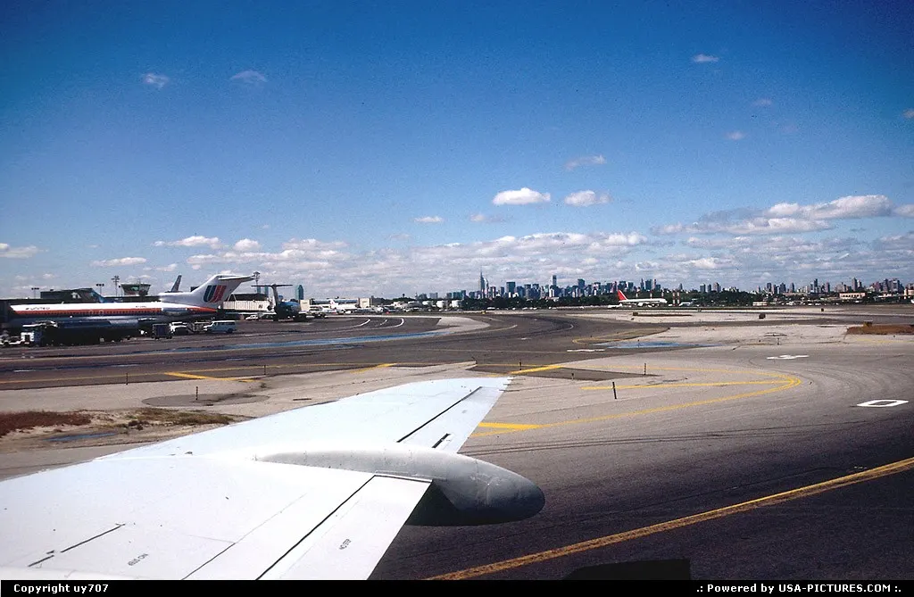 Taxying to gate at La Guardia while NY's distinctive skyline fills the horizon