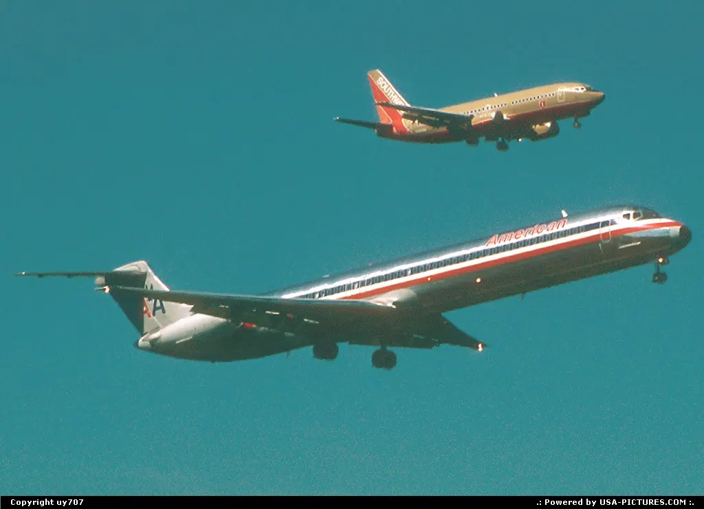Not really practicing some friendly formation flying, American Airlines' MD80 is on sho...