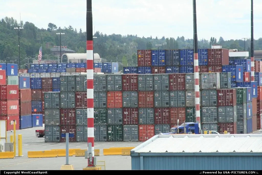 A rampart of containers awaiting dispatching at the harbor.