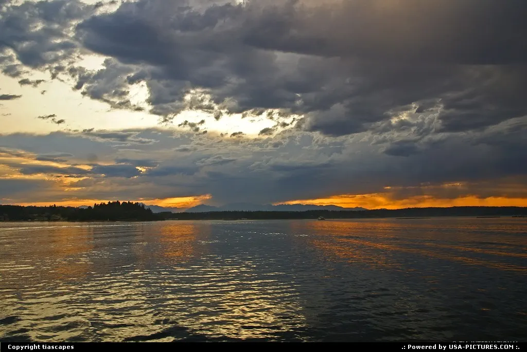 Elemental A sunset unlike any other photographed aboard the Washington State Ferry betw...