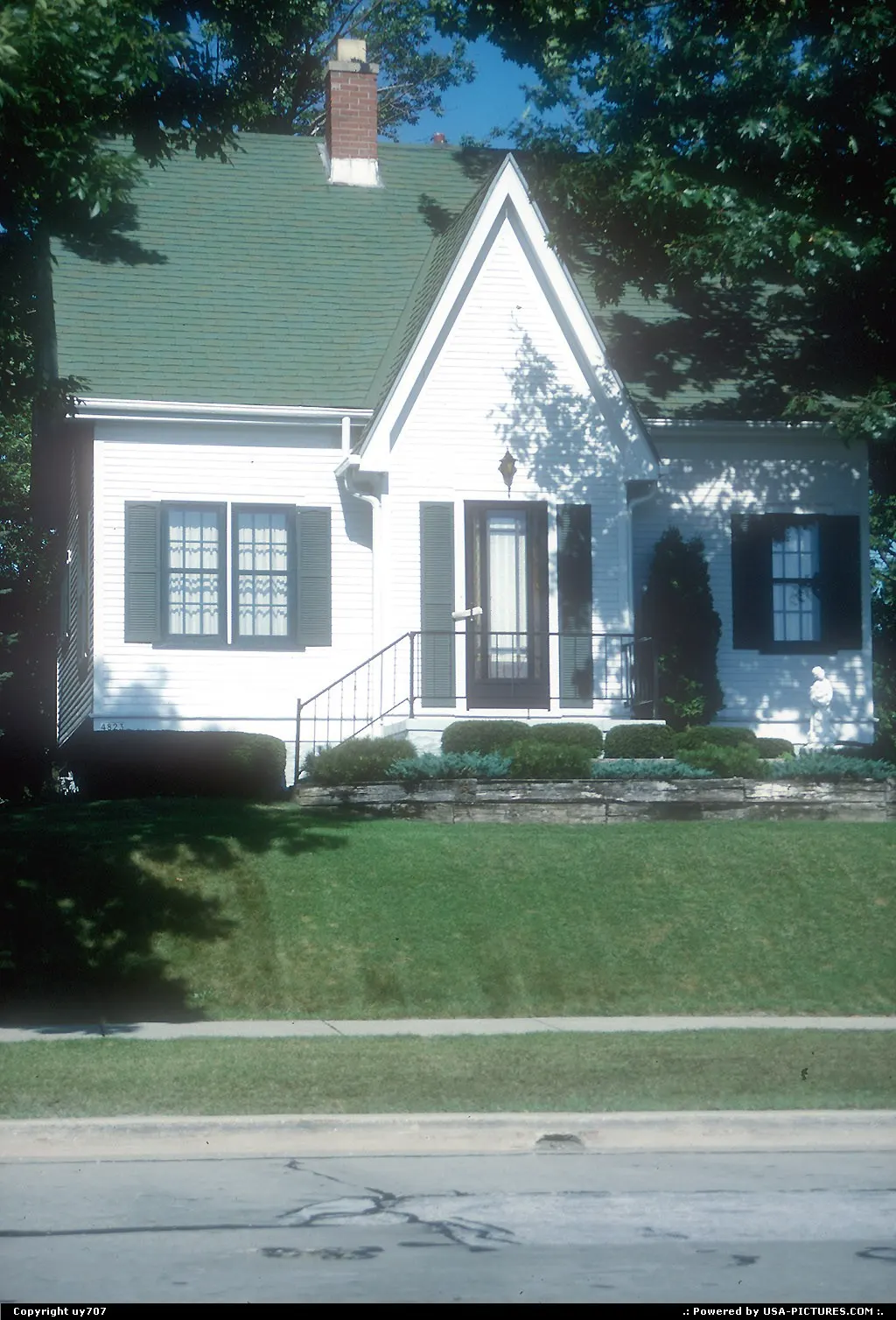 An house among many set along N Lincoln Memorial Drive which runs along Lake Michigan's...