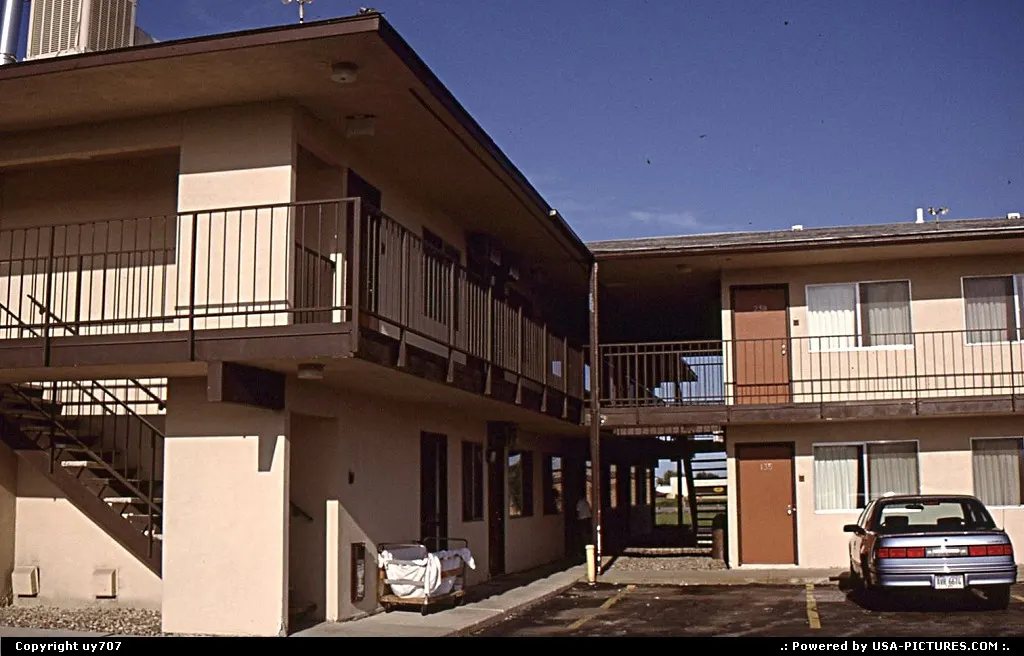 Motel 6 parking lot and close-up on the room complex